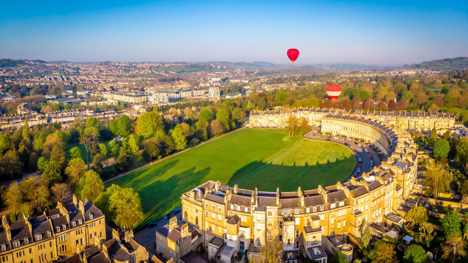 Hot air balloon flying over the Royal Crescent in Bath